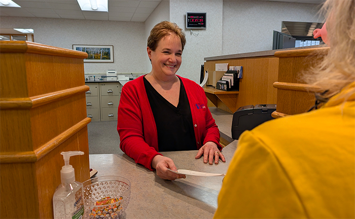 FSB employee helping customer